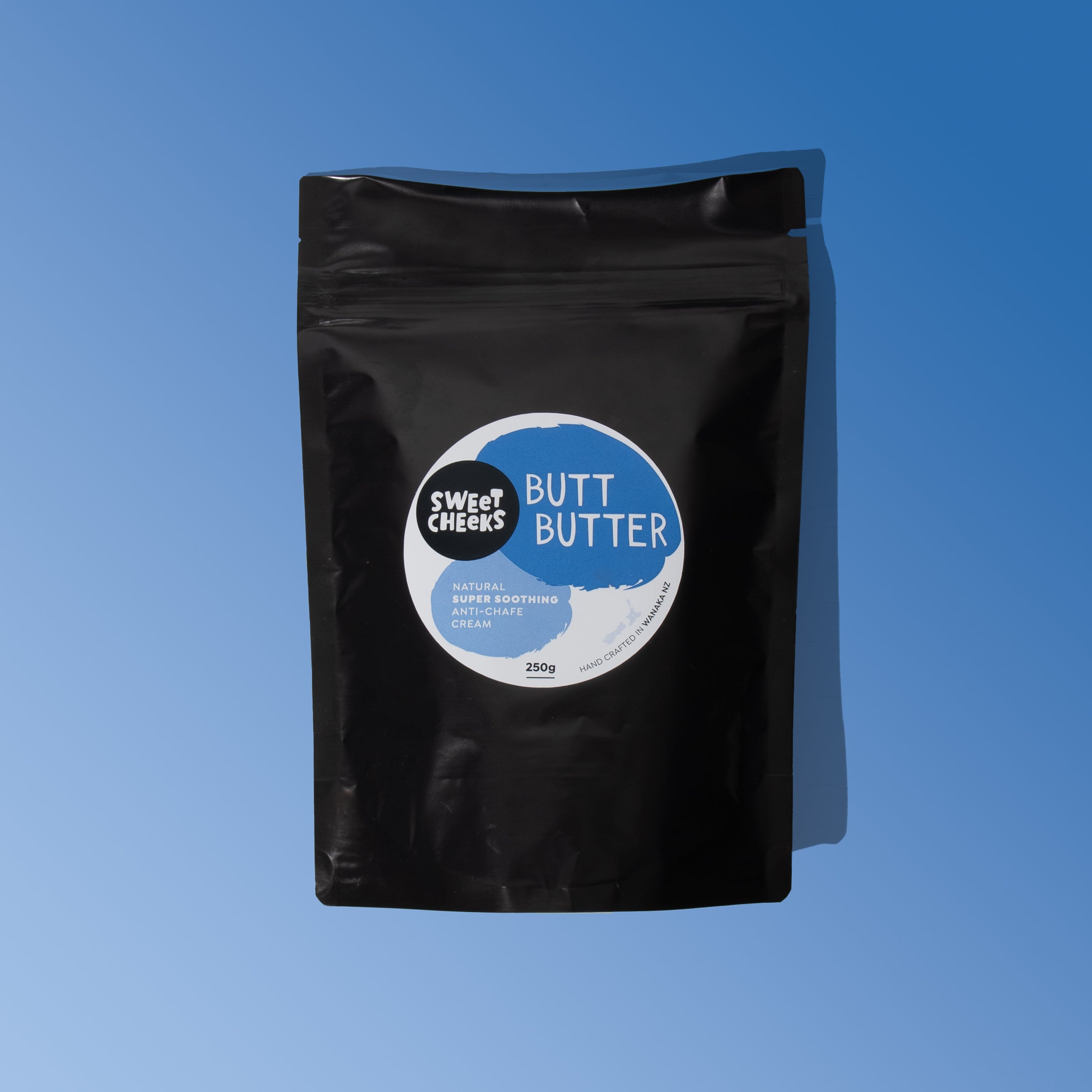 Butt Butter black bag with blue background